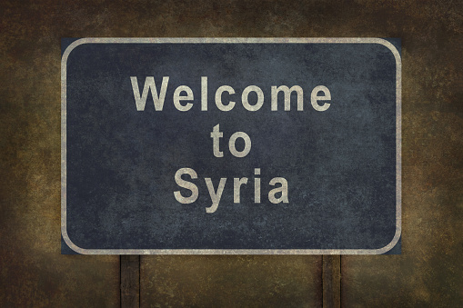 Welcome to Syria road sign illustration with distressed ominous background