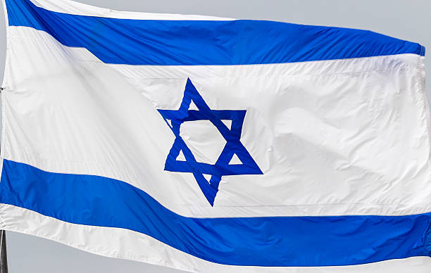 istock Flag of Israel Waving in the Wind 493060804