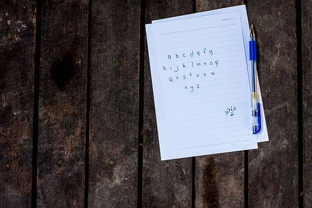 istock Abc wrote a paper on the wooden floor. 493061002