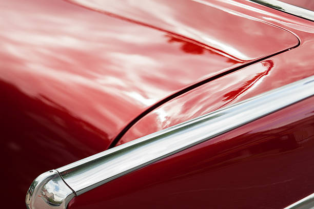 istock Hood and tail fin from vintage red car 493061068