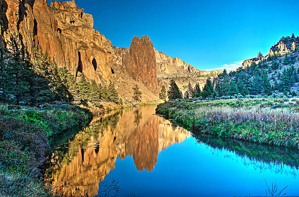 istock Rock reflections in the Crooked River - Smith Rock State Park 493061464