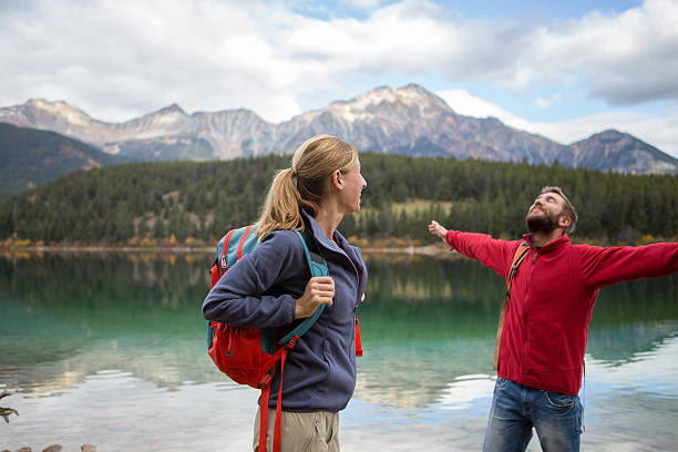 istock Cheering hikers by the lake 493062294