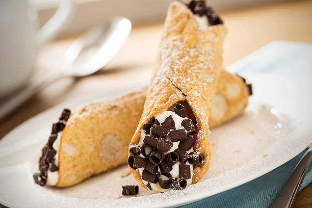 Italian Cannolis Italian cannolis - Please see my portfolio for other food and drink images. cannoli photos stock pictures, royalty-free photos & images