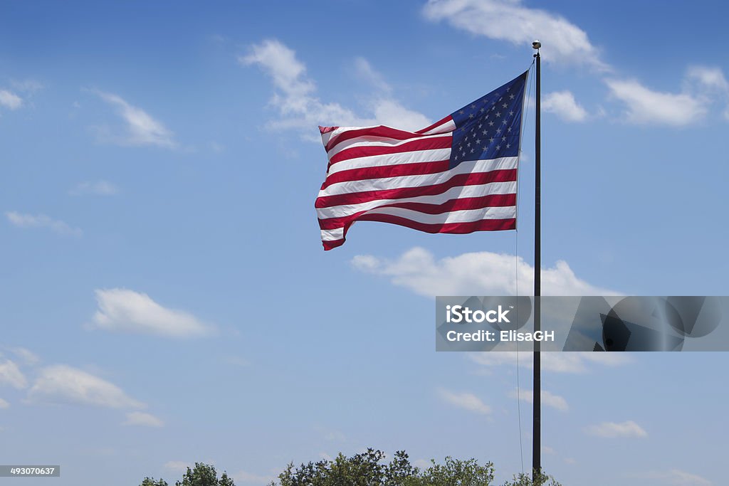American Flag Amerian flag and blue sky American Flag Stock Photo