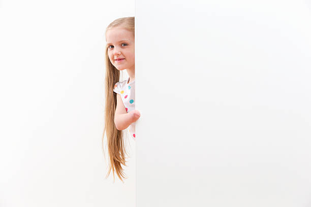 istock Disabled Girl Looking Around White Wall In Studio 493070791