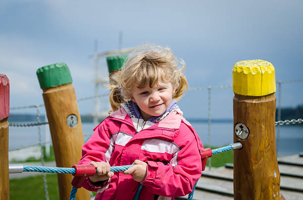 istock child on the playground 493072423