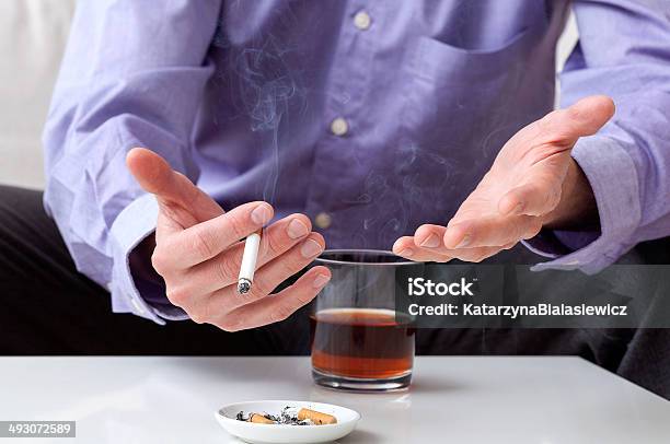 Man With Addictions Stock Photo - Download Image Now - Abuse, Addict, Addiction