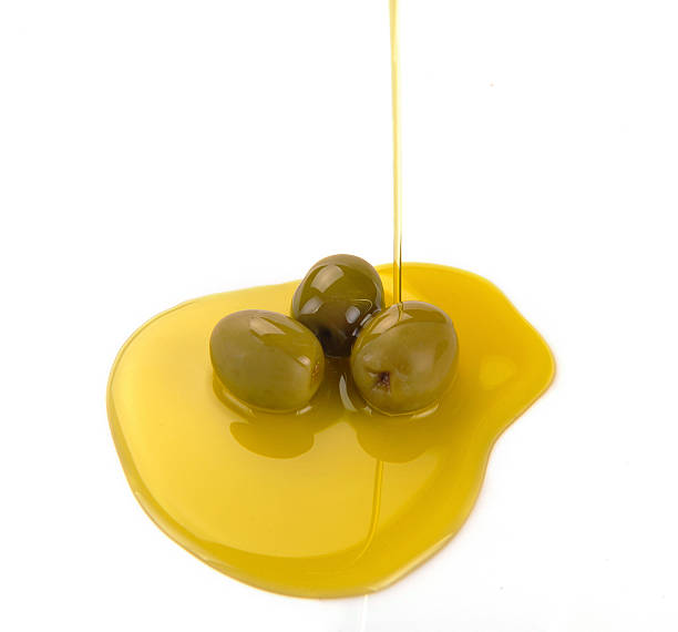 istock Olive oil pouring out 493072671