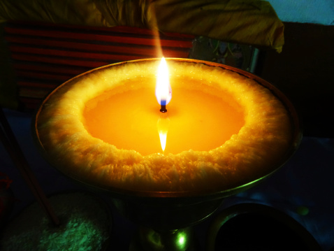 Light offering, butter lamp, representing the illumination of wisdom