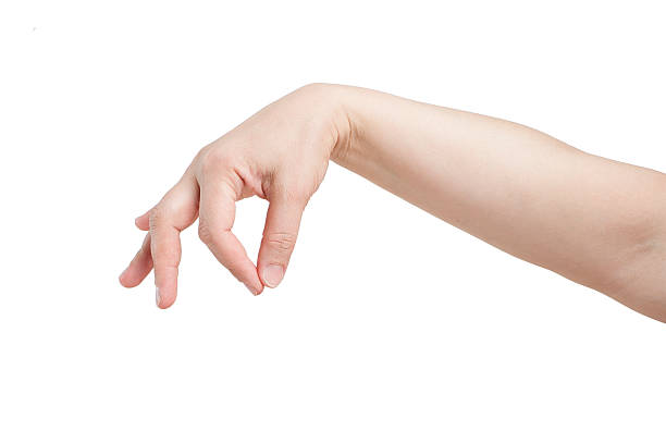 istock Women's hand holds something on a white background. 493079038