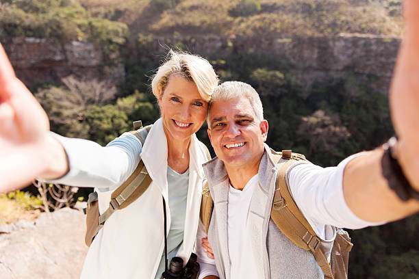 istock hiking couple taking selfie together 493081072