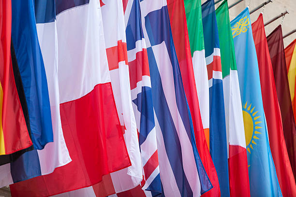istock International Flags blowing in the wind 493084420