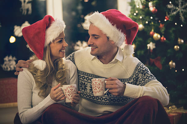 istock Couple drinking coffee together during Christmas holidays 493084628