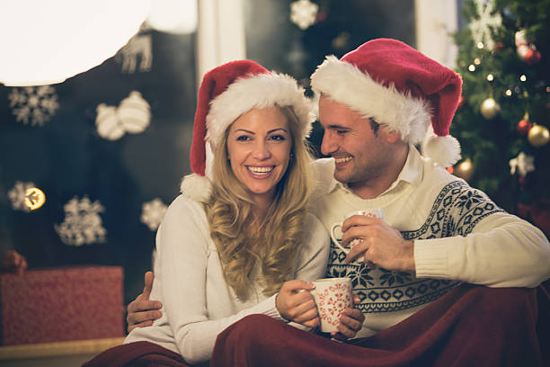 istock Couple drinking coffee together during Christmas holidays 493084682