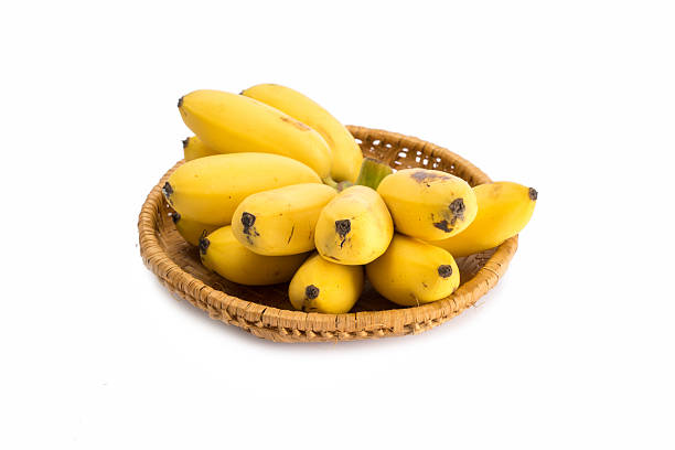istock Bunch of bananas isolated in basket on white background 493086180