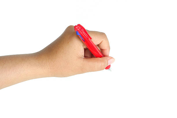 istock Female hand holding pen to white something 493087290