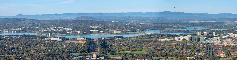 Canberra, Australia, 10 March 2015 at 7.15am. Canberra's city is articulated around lake Burley Griffin and is surrounded by the Brindabella mountains. Many attractions and museums can be found around the lake.