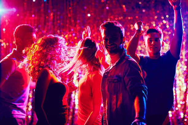 istock Happy friends at disco 493088786