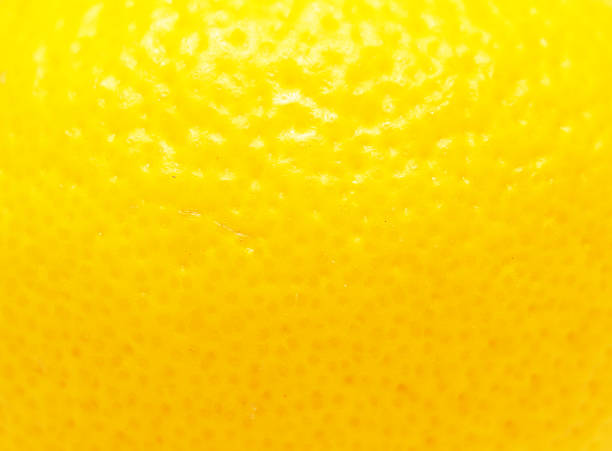 casca de limão. - lemon textured peel portion - fotografias e filmes do acervo