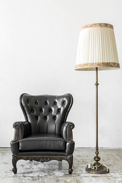 istock Black chair with lamp 493105114