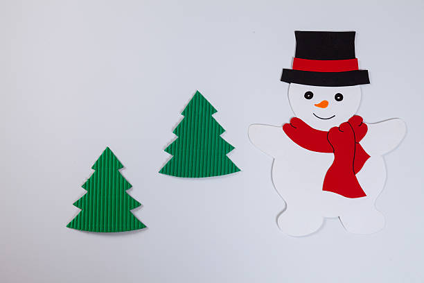 istock Snowman and fir trees, white background 493106048
