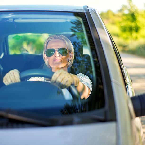 istock Woman driving car 493106450