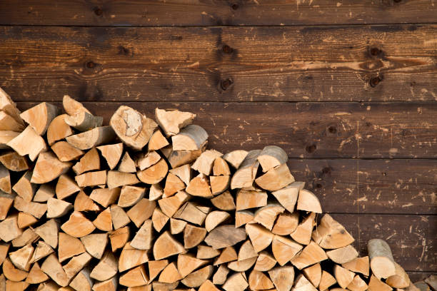 Firewood Pile of firewood woodpile stock pictures, royalty-free photos & images