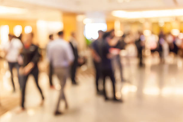 istock Blurred people in grand opening event hall, business concept. 493109802
