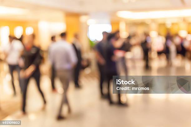 Blurred People In Grand Opening Event Hall Business Concept Stock Photo - Download Image Now