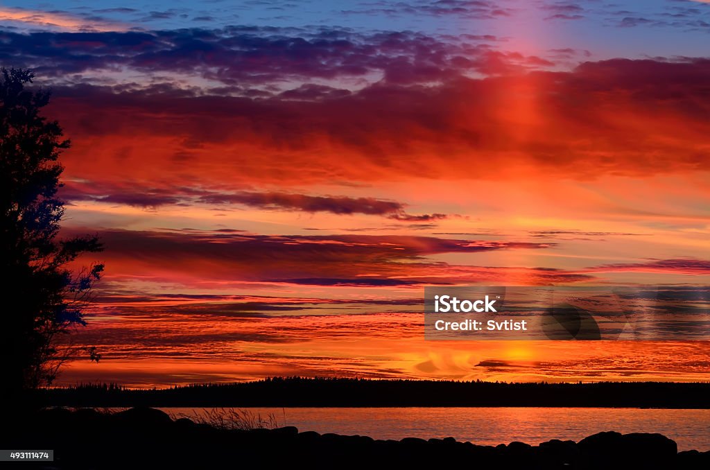 The last ray of the setting sun. Karelia, Russia Last ray of the setting sun. Northern Karelia, Russia 2015 Stock Photo