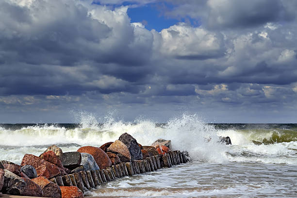 istock Stormy Baltic sea and breakwater 493111496