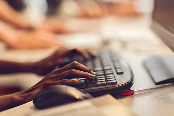 istock Unrecognizable African American person typing on computer keyboard. 493114240