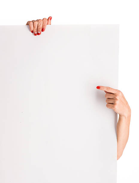 istock woman hands holding big blank paper 493114400