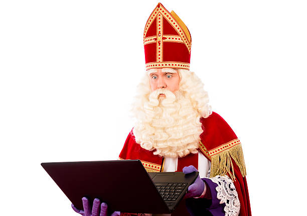 sinterklaas com computador portátil - piet imagens e fotografias de stock