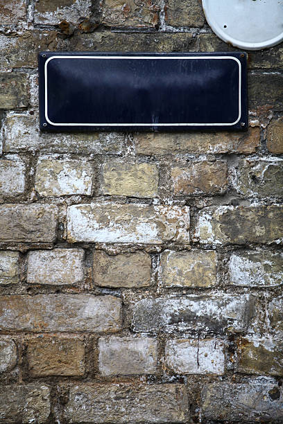 istock Street sign on a brick wall 493115142