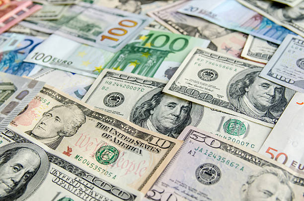 istock US Dollar versus Euro as background 493115832