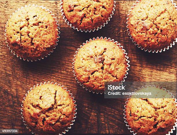 Homemade Carrot Muffins On Brown Wooden Background Stock Photo - Download Image Now - Muffin, Pumpkin, Carrot