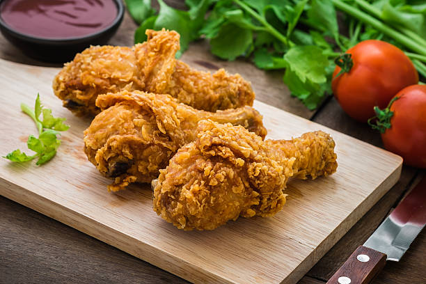 istock Crispy fried chicken on wooden cutting board and dip sauce 493120730