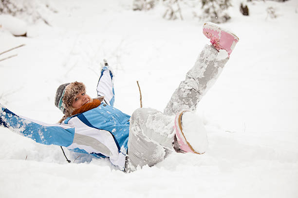 istock Young woman having fun in snow 493149210