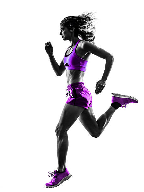 istock woman runner running jogger jogging silhouette 493149392