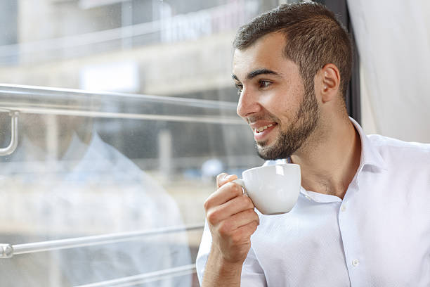 istock Handsome businessman on coffee break 493150620