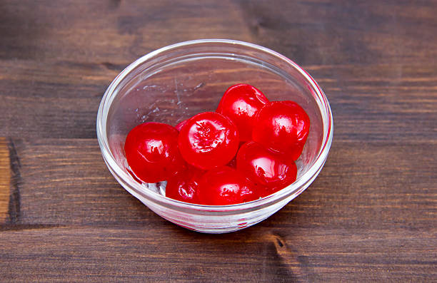 istock Candied cherries on bowl on wood 493151016
