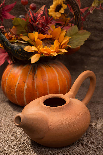 istock earthenware teapot with a decorative pumpkin 493153350