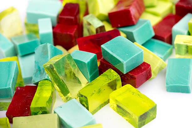 istock Stack of coloful glass mosaic tiles on white background 493154514