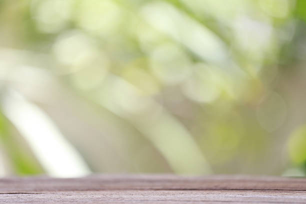 istock wood floor and colorful bokeh. 493155306
