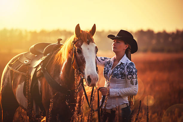 istock girl and horse 493155442