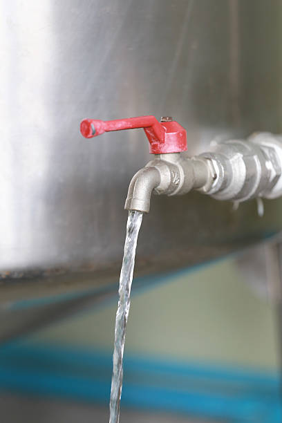 istock Water flowing from the tap. 493159696