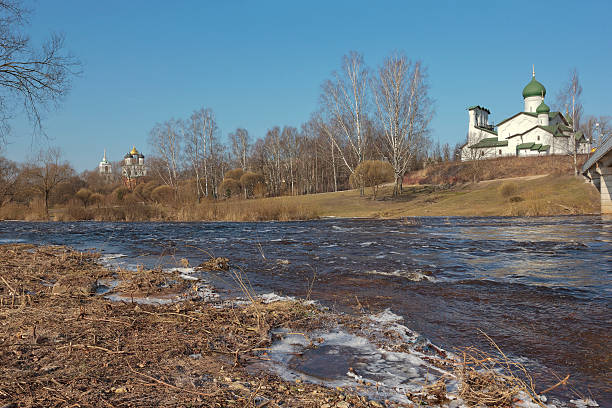 istock Spring landscape with old church in Pskov, Russia 493160066