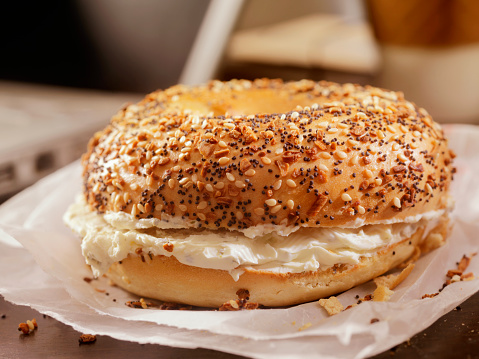 Toasted Bagel with Cream Cheese at your Desk - Photographed on a Hasselblad H3D11-39 megapixel Camera System