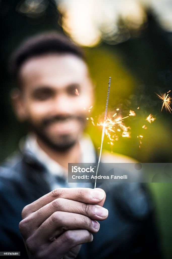 Boy whit sparkler 2015 Stock Photo